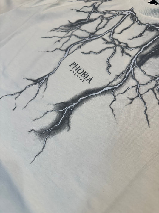 WHITE T-SHIRT WITH FRONT AND WHITE REFLECTIVE LIGHTNING