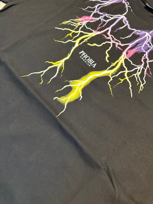 BLACK T-SHIRT WITH PURPLE AND YELLOW LIGHTNING