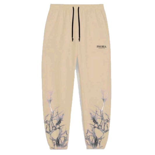 BEIGE PANTS WITH BLACK LIGHTNING